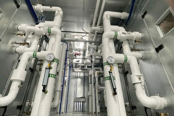Commercial plumbing system with expertly installed pipes, gauges, and fittings showcasing professional plumbing repair and installation work for reliable water flow and performance.