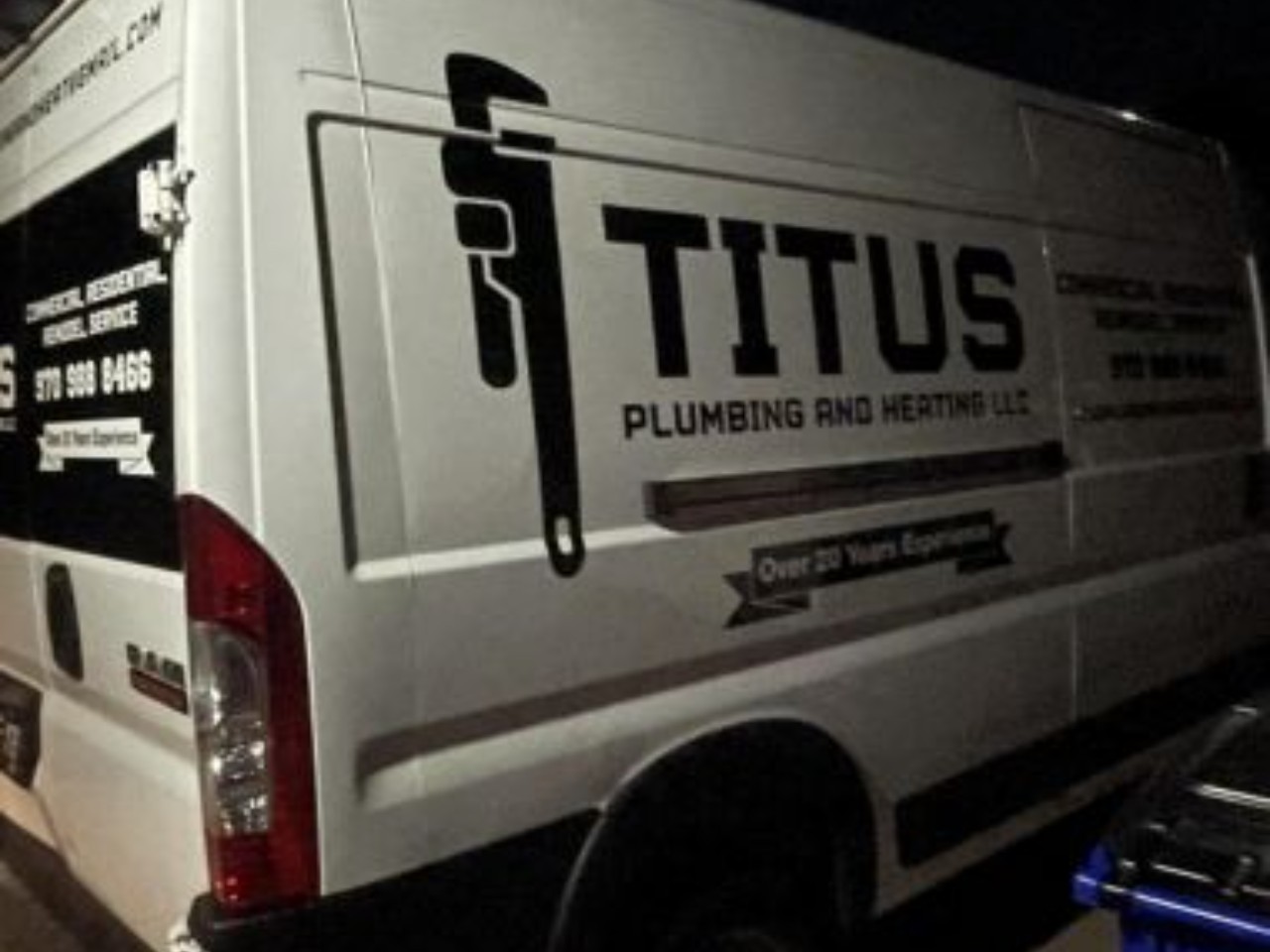 Titus Plumbing and Heating LLC service van ready for reliable plumbing and heating solutions with over 20 years of trusted experience.